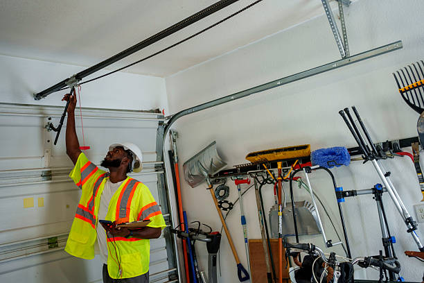 Professional Garage Door Panel Replacement technician working in Creston, IA